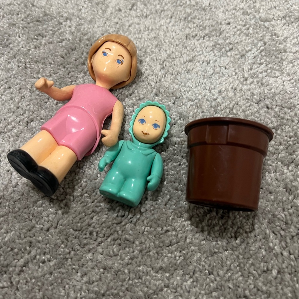 Pink and Green Doll Figures with Accessories